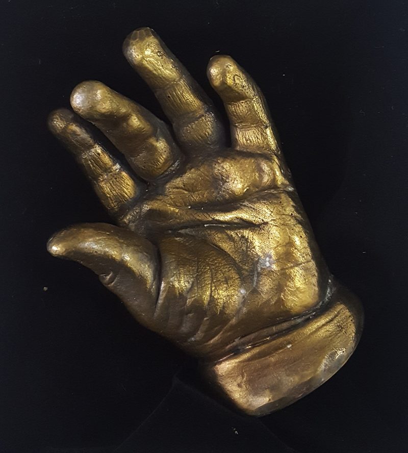 Bronze statue single hand baby